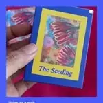 The Seeding card with a painted cover
