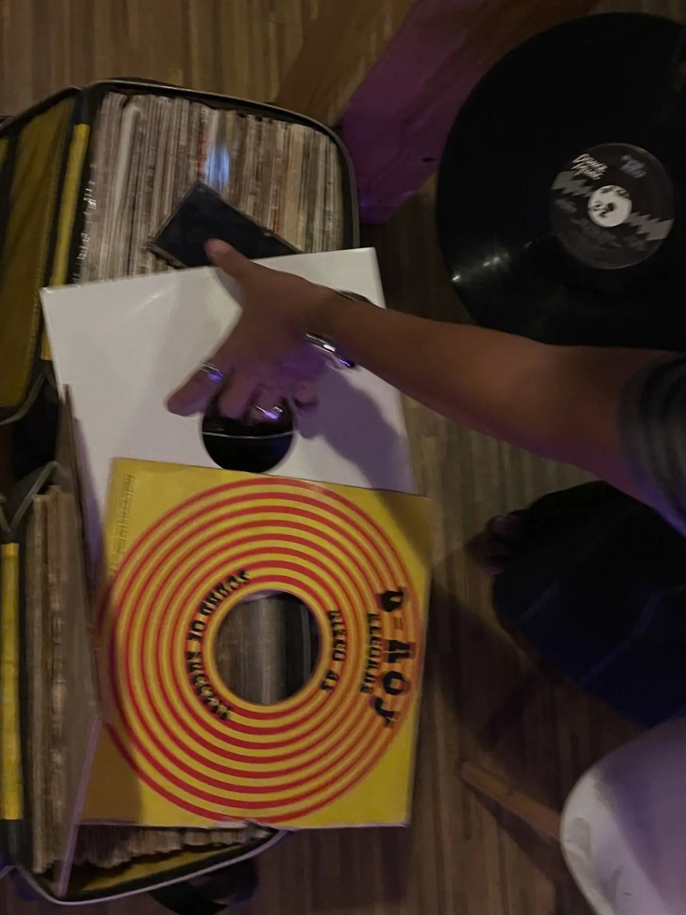 Flicking through a crate of vinyl records